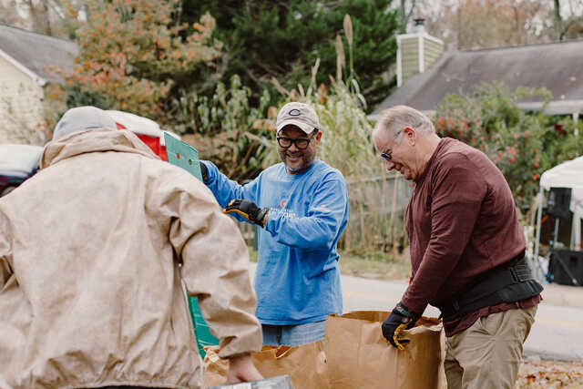 volunteers serving in the community for be rich