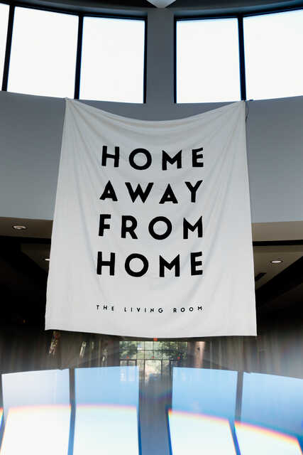 home away from home banner at the living room